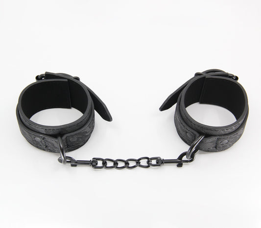 Love In Leather Black Lace Printed Wrist Restraints With Matte Black Hardware And Chain Join