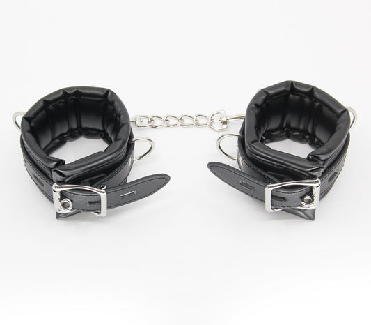 Love In Leather Heavily Padded Wrist Restraints With Dee Rings Lockable Buckles
