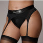 Shots Toys | OUCH! Vibrating Strap-On Thong with Adjustable Garters - Black - Size XL/XXL