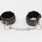 Love In Leather Black Faux Leather Wrist Cuffs With Red Metallic Heart