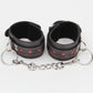 Love In Leather Black Faux Leather Wrist Cuffs With Red Metallic Heart