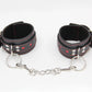 Love In Leather Black Faux Leather Wrist Cuffs With Red Metallic Heart