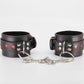 Love In Leather Black Faux Leather Wrist Cuffs With Red Metallic Heart