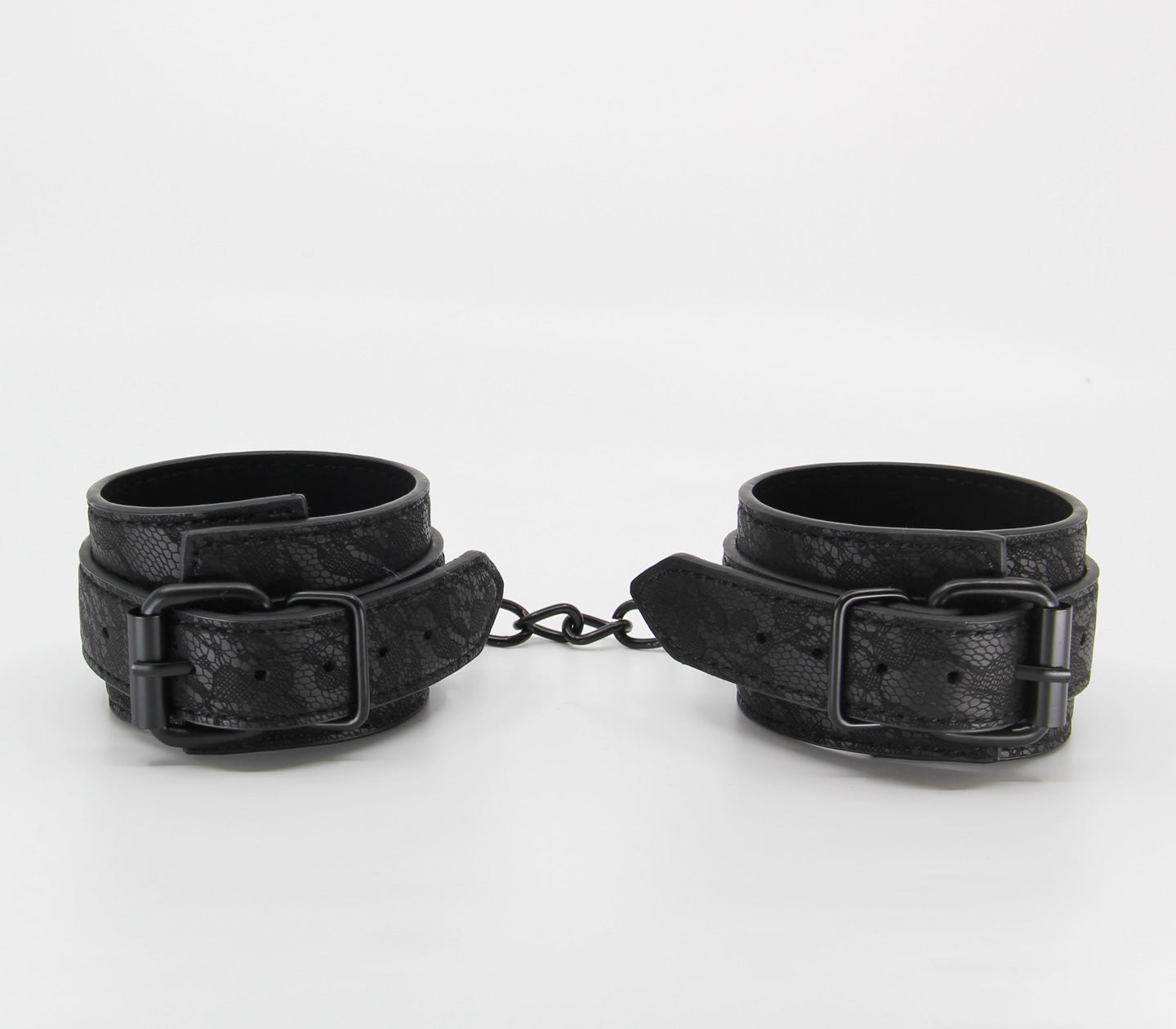 Love In Leather Black Lace Printed Wrist Restraints With Matte Black Hardware And Chain Join