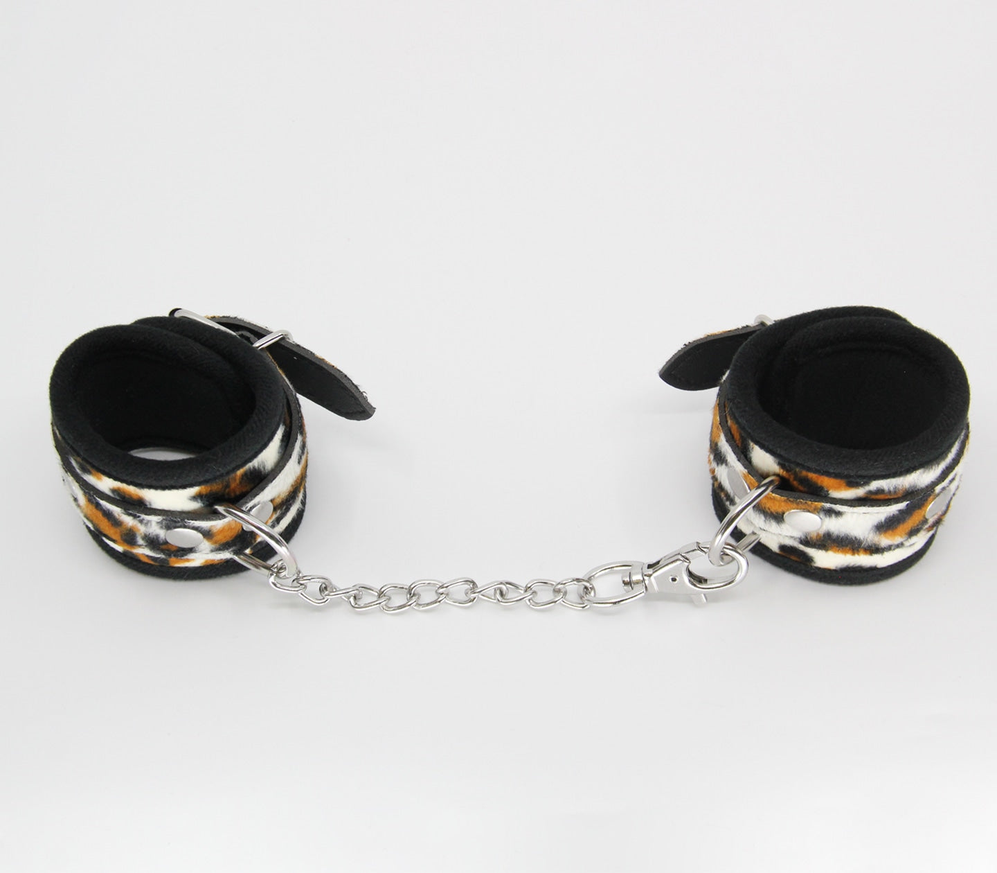 Love In Leather Furry Animal Print Wrist Restraints With Detachable Chain Join