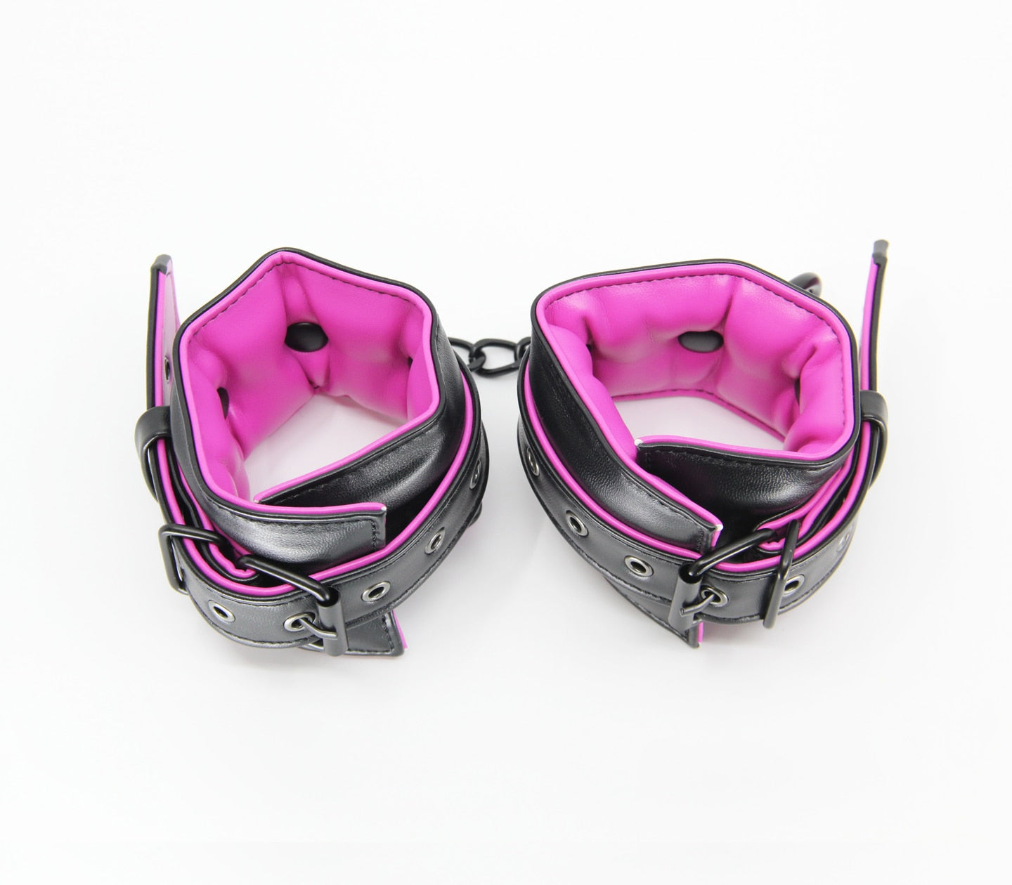 Love In Leather Black Padded Wrist Restraints With Contrast Hot Pink Lining, Matte Black Hardware