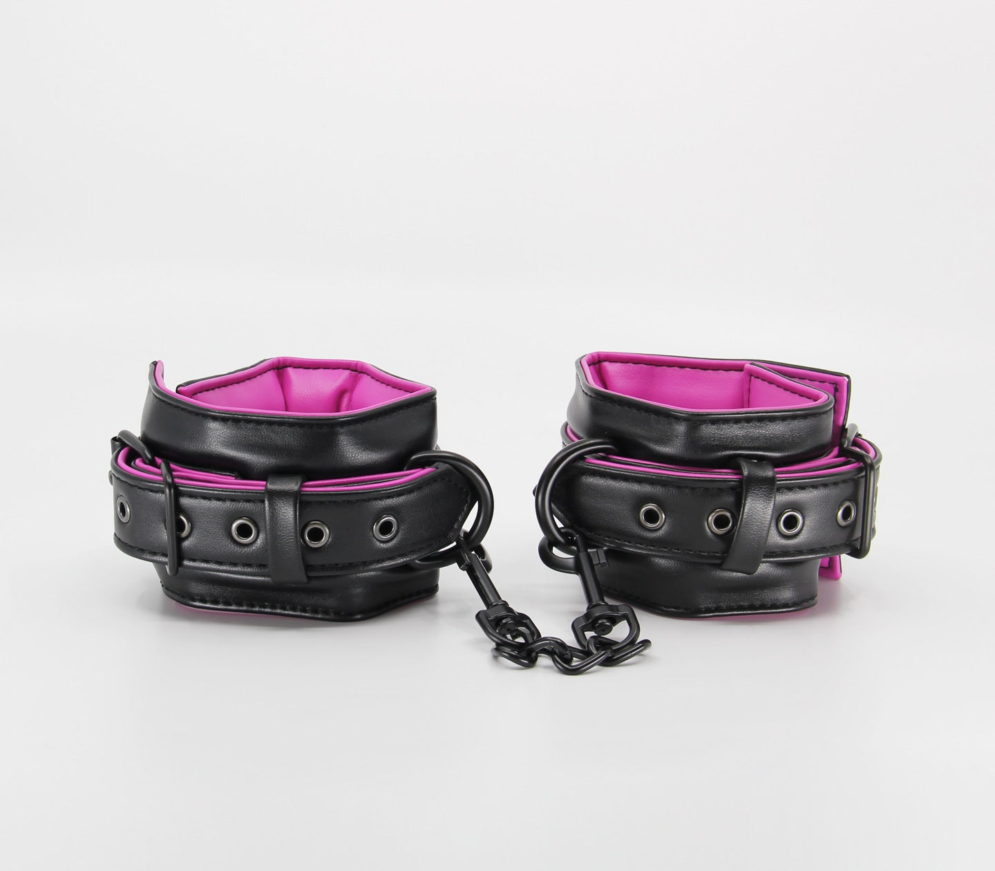 Love In Leather Black Padded Wrist Restraints With Contrast Hot Pink Lining, Matte Black Hardware